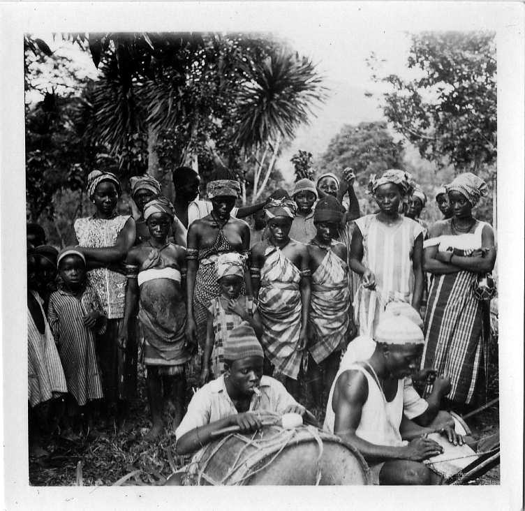 Mende drummers photographed in Sierra Leone in 1936, playing traditional drums
